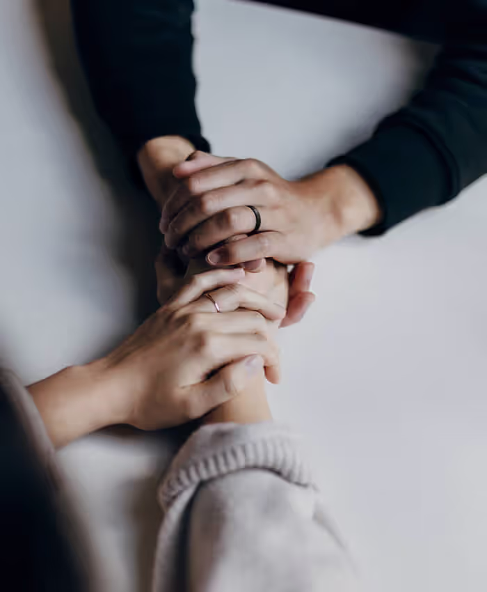 two people having a counselling session in a comfortable setting